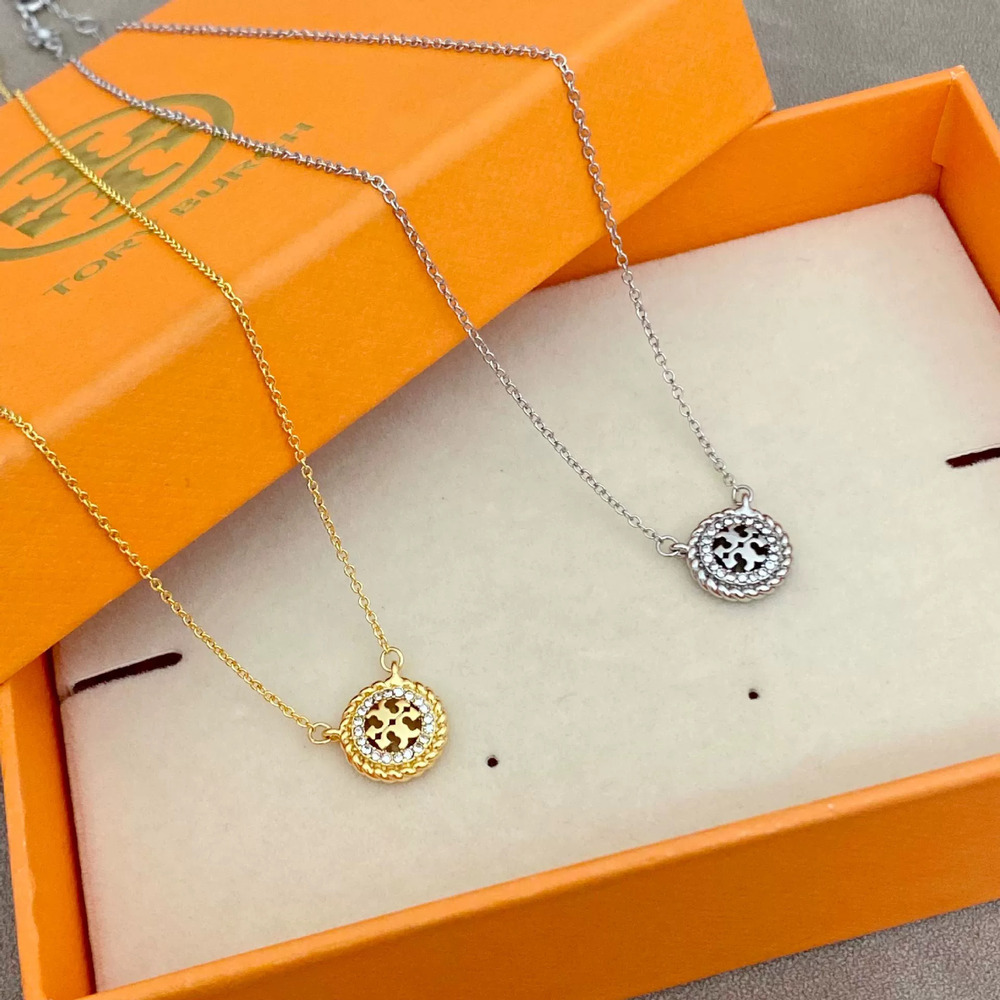 Tory Burch Rhinestone Gold Plated Round Hollow Necklace